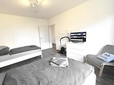 Ein Bett oder Betten in einem Zimmer der Unterkunft VAZ Apartments Freiheit 2 für Monteure