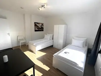 Ein Bett oder Betten in einem Zimmer der Unterkunft VAZ Apartments Freiheit 2 für Monteure