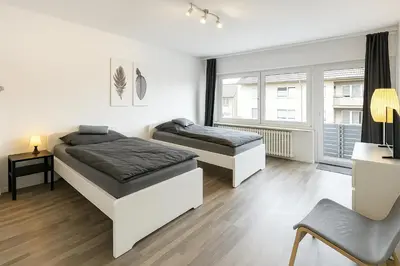 Ein Bett oder Betten in einem Zimmer der Unterkunft VAZ Apartments Freiheit 2 für Monteure