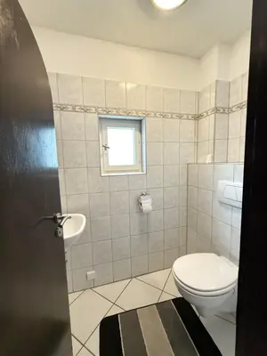 Ein Badezimmer in der Unterkunft Ferienwohnung Hügelstraße