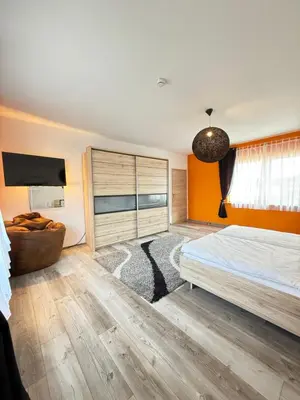 Ein Bett oder Betten in einem Zimmer der Unterkunft Ferienwohnung Hügelstraße