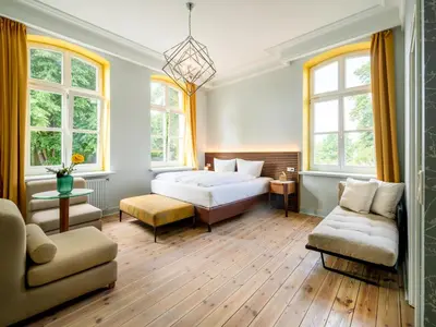 Ein Sitzbereich in der Unterkunft Stuckhotel Fettehenne