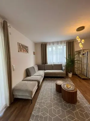 Ein Sitzbereich in der Unterkunft Moderne Wohnung mit 4 Betten