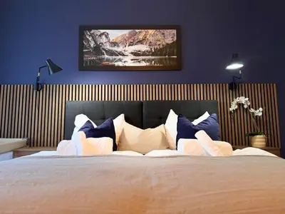 Ein Bett oder Betten in einem Zimmer der Unterkunft Zentrale Wohnung direkt am Hauptbahnhof - Bismarck