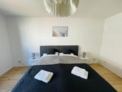 Ein Bett oder Betten in einem Zimmer der Unterkunft modern * zentral * Netflix * Arbeitsplatz