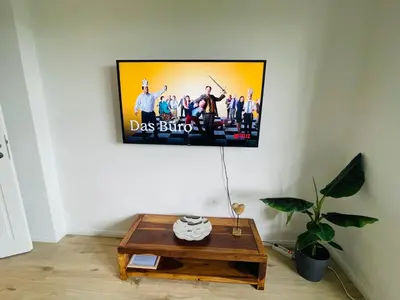 TV/Unterhaltungsangebot in der Unterkunft modern * zentral * Netflix * Arbeitsplatz
