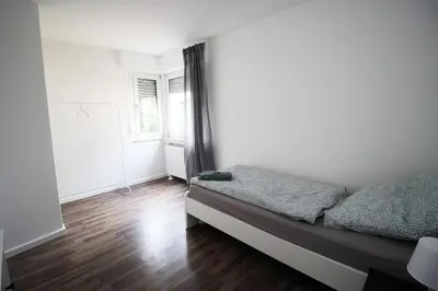 Ein Bett oder Betten in einem Zimmer der Unterkunft Cozy Apartment in Remscheid