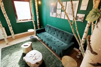 Ein Sitzbereich in der Unterkunft Wood Lodge mit Kinderzimmer I Messe l City l Flughafen l Hbf