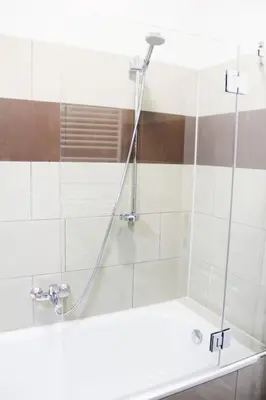 Ein Badezimmer in der Unterkunft Wood Lodge mit Kinderzimmer I Messe l City l Flughafen l Hbf