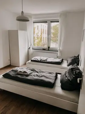 Ein Bett oder Betten in einem Zimmer der Unterkunft Im Herzen Essens! Gemütlich und zentral wohnen! HO2R