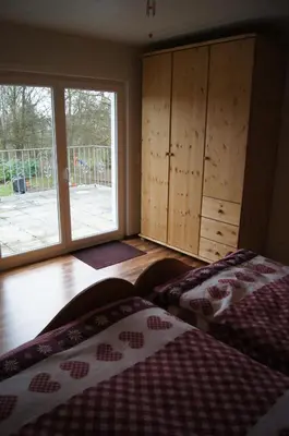 Ein Bett oder Betten in einem Zimmer der Unterkunft Ferienwohnung Bergisch Land