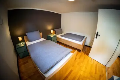 Ein Bett oder Betten in einem Zimmer der Unterkunft Gemütliche 2-Zimmer Souterrain Wohnung