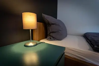 Ein Bett oder Betten in einem Zimmer der Unterkunft Gemütliche 2-Zimmer Souterrain Wohnung
