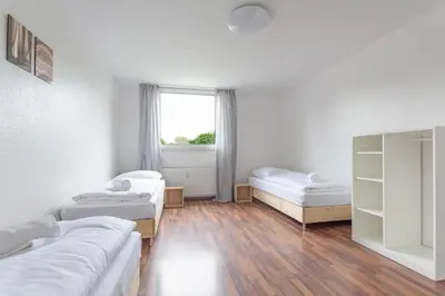 Ein Bett oder Betten in einem Zimmer der Unterkunft T&K Apartments Oberhausen 2 room Apartments
