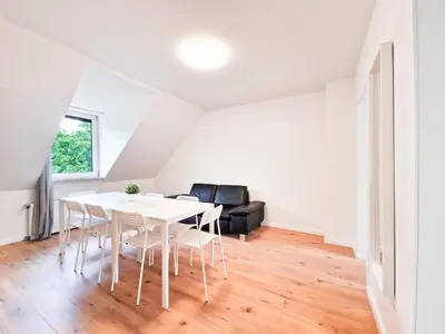 Ein Sitzbereich in der Unterkunft Tolstov Apartments - 3 and 4 Room Apartments