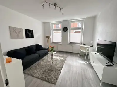 TV/Unterhaltungsangebot in der Unterkunft Möblierte Erdgeschoss-Wohnung mit Parkplatz in bester Lage des Stadtzentrums Herne, WLAN, Netflix- Super Autobahn-und ÖPNV-Anbindung