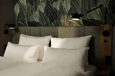 Ein Bett oder Betten in einem Zimmer der Unterkunft The Cloud One Düsseldorf-KöBogen