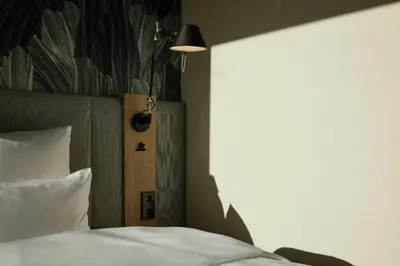 Ein Bett oder Betten in einem Zimmer der Unterkunft The Cloud One Düsseldorf-KöBogen