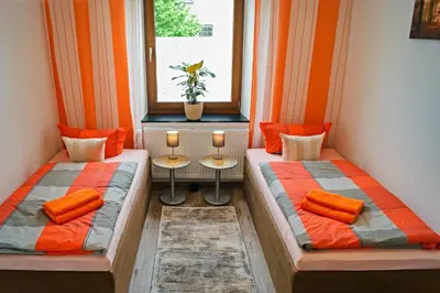 Ein Bett oder Betten in einem Zimmer der Unterkunft Charmante & Gemütliche Wohnung