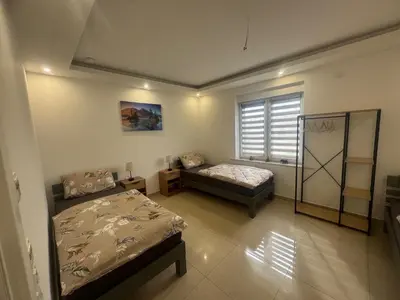 Ein Bett oder Betten in einem Zimmer der Unterkunft Exklusive Flughafen-Messe Apartment nähe Düsseldorf