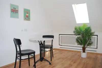 Ein Sitzbereich in der Unterkunft Altenbochumer Apartment