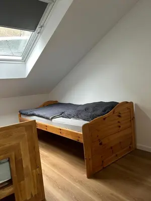 Ein Bett oder Betten in einem Zimmer der Unterkunft Moderne Service Apartment / Ferienwohnung