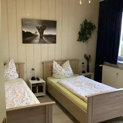 Ein Bett oder Betten in einem Zimmer der Unterkunft Schönes Zimmer 1 Etage inkl Parkplatz nach Verfügbarkeit