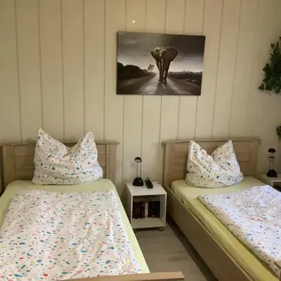 Ein Bett oder Betten in einem Zimmer der Unterkunft Schönes Zimmer 1 Etage inkl Parkplatz nach Verfügbarkeit