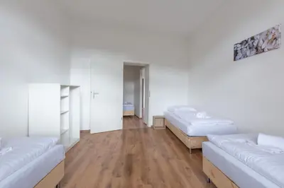 Ein Bett oder Betten in einem Zimmer der Unterkunft T&K Apartments Duisburg 4 Apartments 110qm with balcony