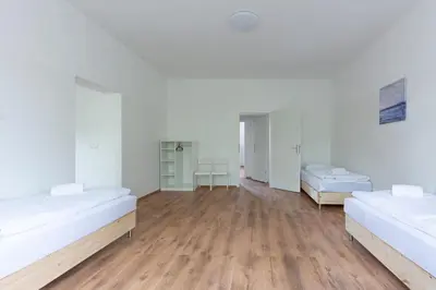 Ein Bett oder Betten in einem Zimmer der Unterkunft T&K Apartments Duisburg 4 Apartments 110qm with balcony