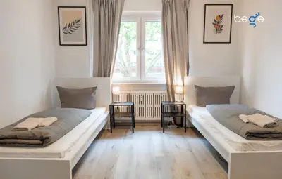 Ein Bett oder Betten in einem Zimmer der Unterkunft BEGE APARTMENTS: PERFECT FOR COMPANIES