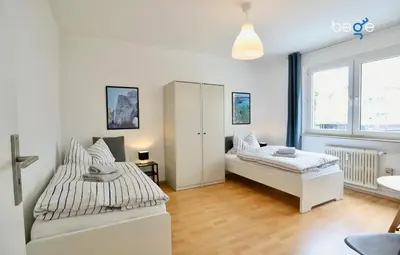 Ein Bett oder Betten in einem Zimmer der Unterkunft BEGE APARTMENTS: PERFECT FOR COMPANIES
