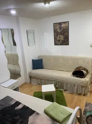 Ein Sitzbereich in der Unterkunft Schönes Doppelbettzimmer im Untergeschoss inkl Parkplatz nach Verfügbarkeit