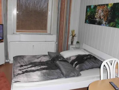 Ein Bett oder Betten in einem Zimmer der Unterkunft Lovely Apartment 2 Et Inkl Parkplatz nach Verfügbarkeit