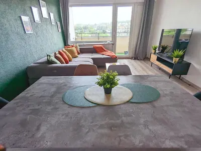 Ein Bett oder Betten in einem Zimmer der Unterkunft Schöne Wohnung mit Balkon/Parkplatz/Aufzug
