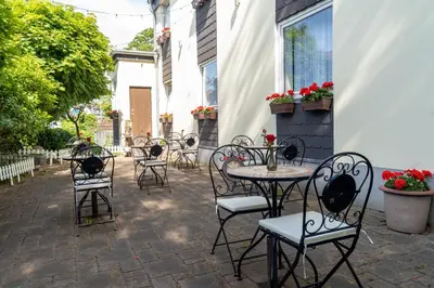 Ein Restaurant oder anderes Speiselokal in der Unterkunft Jupa's Hotel