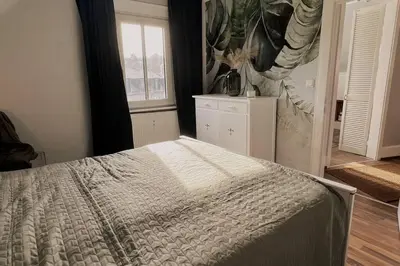 Ein Bett oder Betten in einem Zimmer der Unterkunft Geschmackvolle Wohnung 65qm in Solingen NRW
