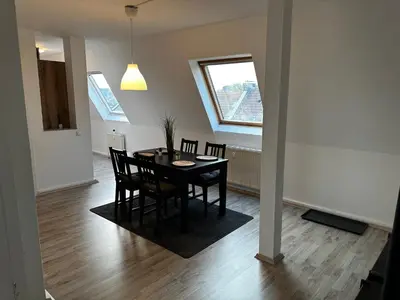 Ein Sitzbereich in der Unterkunft A&V Apartments Schöne Dachgeschoss Wohnung Apt Sterne