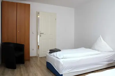Ein Bett oder Betten in einem Zimmer der Unterkunft Ferienwohnung A 101