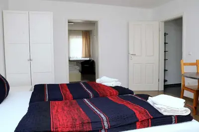 Ein Bett oder Betten in einem Zimmer der Unterkunft Ferienwohnung A 104