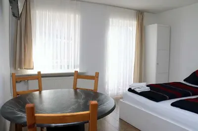 Ein Bett oder Betten in einem Zimmer der Unterkunft Ferienwohnung A 104