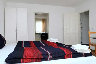 Ein Bett oder Betten in einem Zimmer der Unterkunft Ferienwohnung A 104
