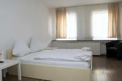 Ein Bett oder Betten in einem Zimmer der Unterkunft Ferienwohnung A 104