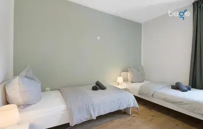 Ein Bett oder Betten in einem Zimmer der Unterkunft BEGE APARTMENTS: STAY & WORK