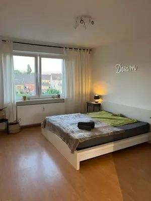 Ein Bett oder Betten in einem Zimmer der Unterkunft Möblierte Wohnung in Duisburg