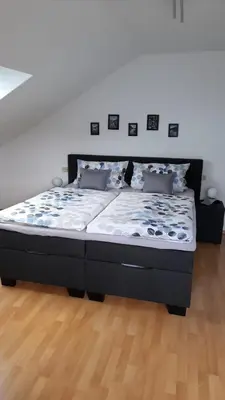 Ein Bett oder Betten in einem Zimmer der Unterkunft Stadt-Land-Fluss