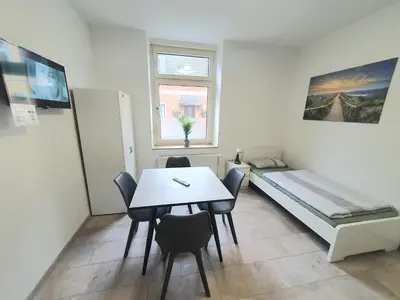 Ein Bett oder Betten in einem Zimmer der Unterkunft Stadtmensch Oberhausen 3 Schlafzimmer
