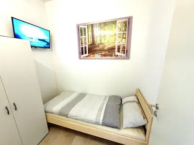 Ein Bett oder Betten in einem Zimmer der Unterkunft Stadtmensch Oberhausen 3 Schlafzimmer