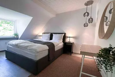 Ein Bett oder Betten in einem Zimmer der Unterkunft City Apprtment with Netflix, 2Tv