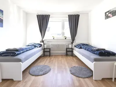 Ein Bett oder Betten in einem Zimmer der Unterkunft VAZ Apartments Home-at-Work für Monteure und Fachkräfte TV, WLAN, Balkon, Küche, Parkplatz